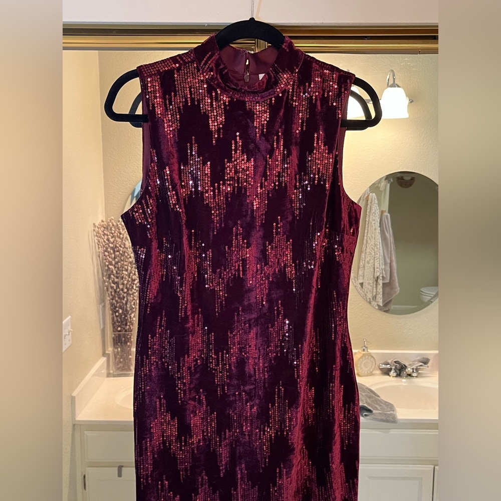 Deep red / burgundy velvet midi, sleeveless dress adorned with sequins.